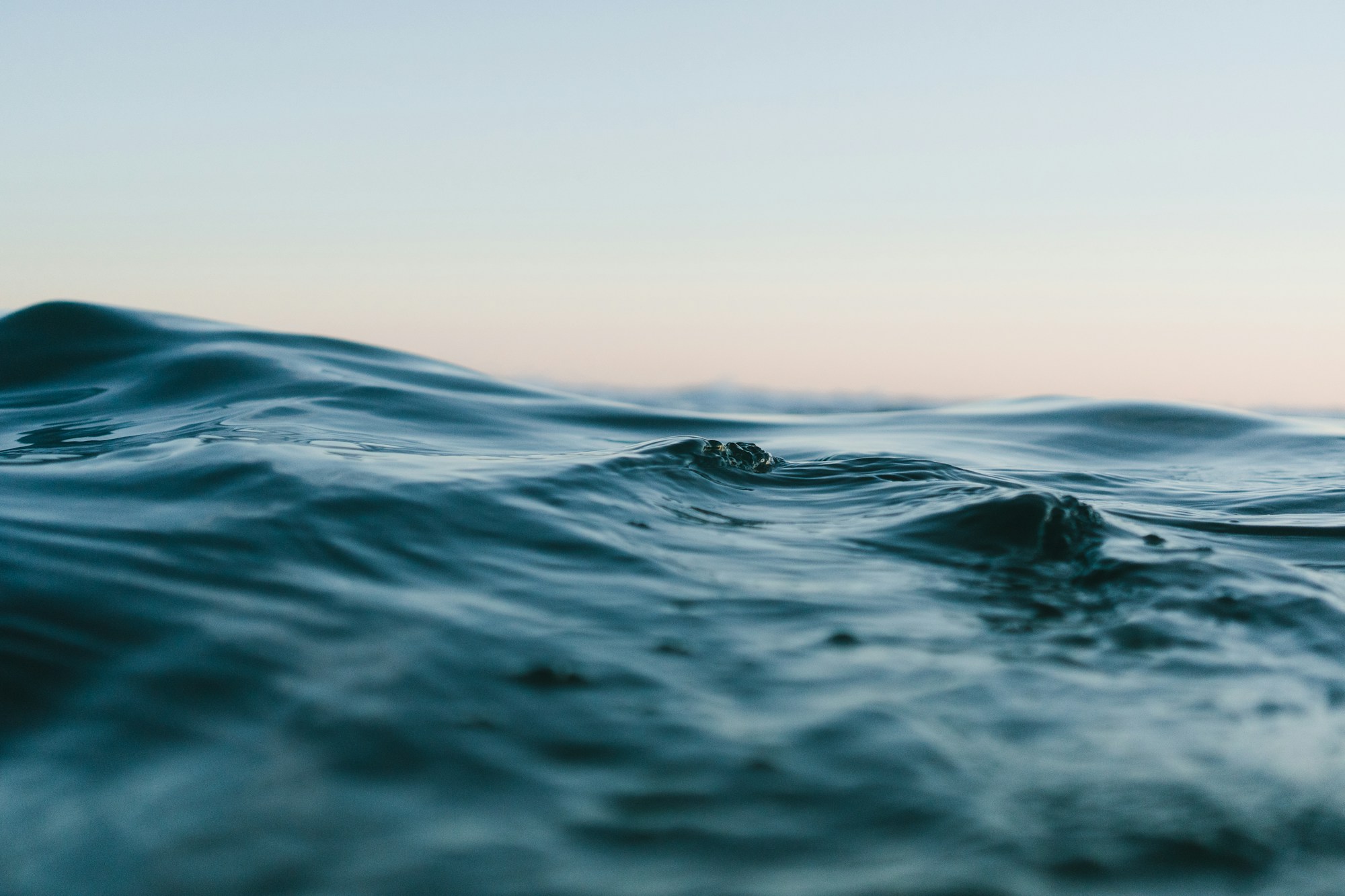 Ocean waves meeting a rugged coastline